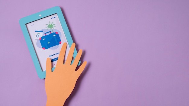 A hand hovering over a credit card while shopping online on a tablet, focusing on the credit card security chip. The background shows a secure checkout page with a padlock icon.