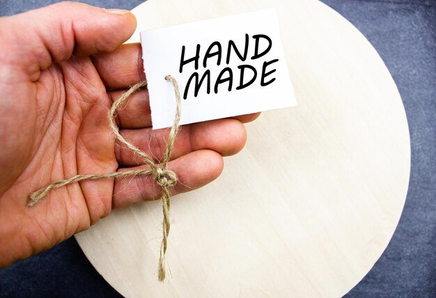 A close-up shot of a Fair Trade certification label on a handcrafted product being sold on an ethical online retail website.