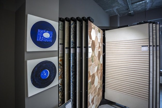 A diagram illustrating the optimal placement of acoustic panels in a room, showing how to cover key reflection points on walls and ceilings to minimize echo and improve sound clarity for recording and listening purposes.